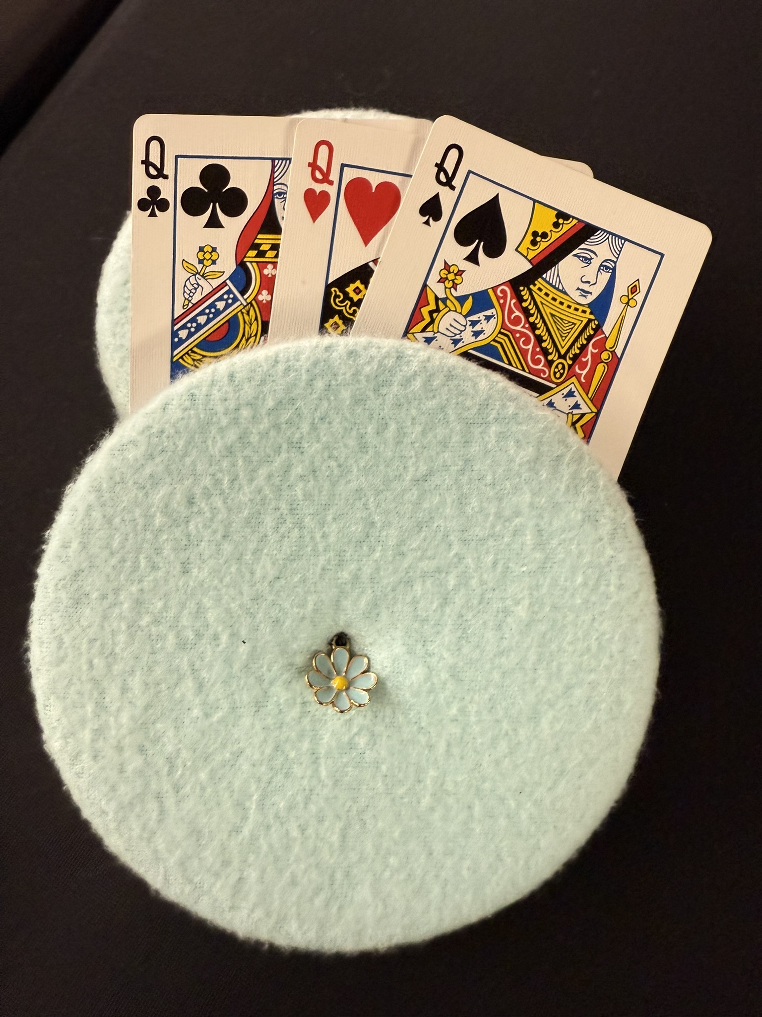 turquoise playing cards holder with blue flower charm