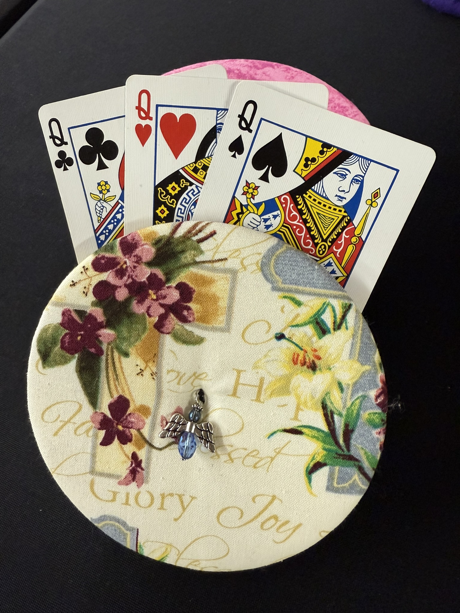 floral pattern playing cards holder with blue bead angel charm